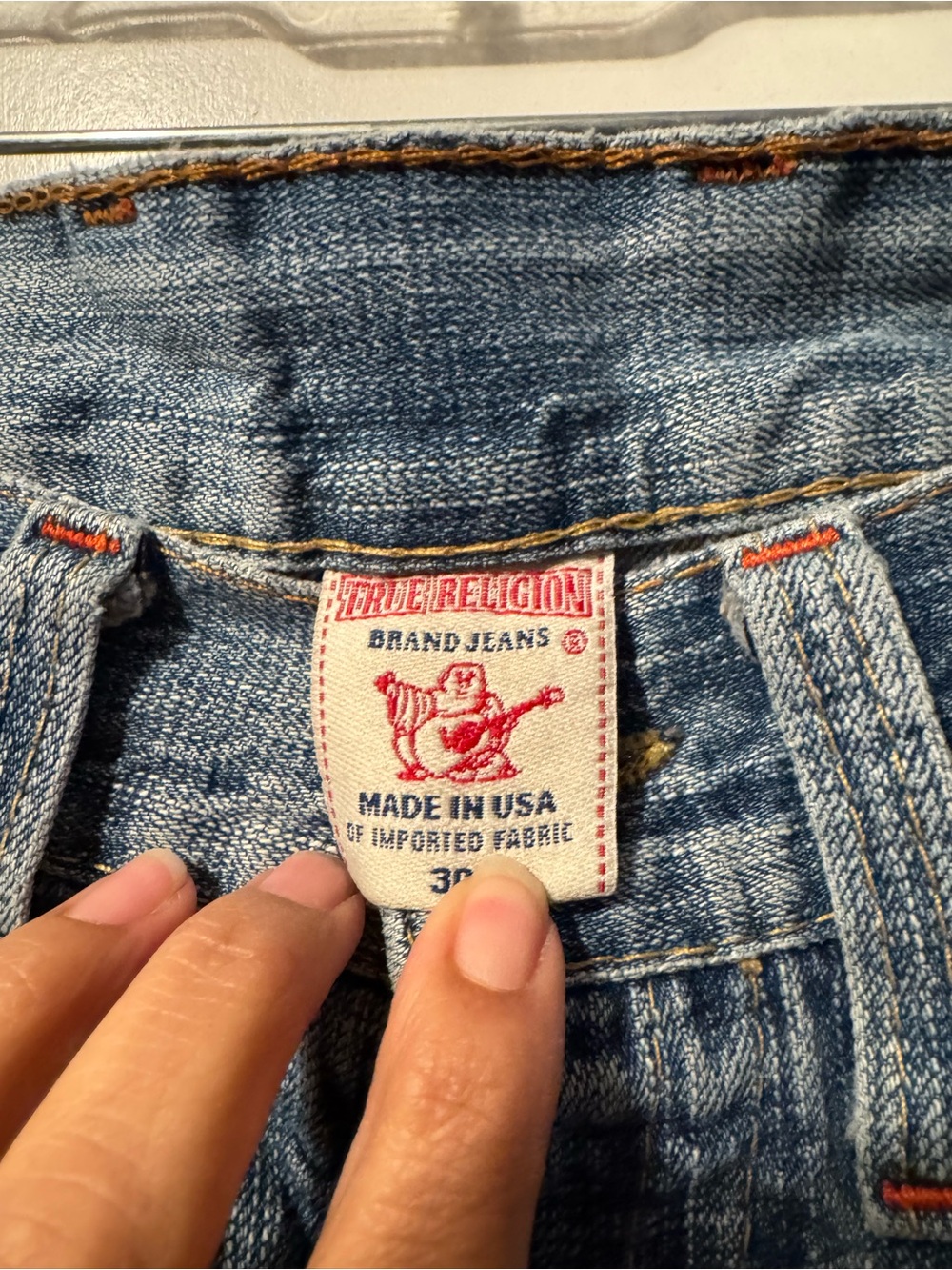 True Religion Jeans Patch with Red Logo on Light Blue Denim